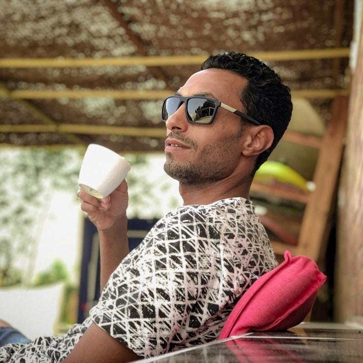 Portrait of Alex Romano, community mentor and Italian cuisine specialist